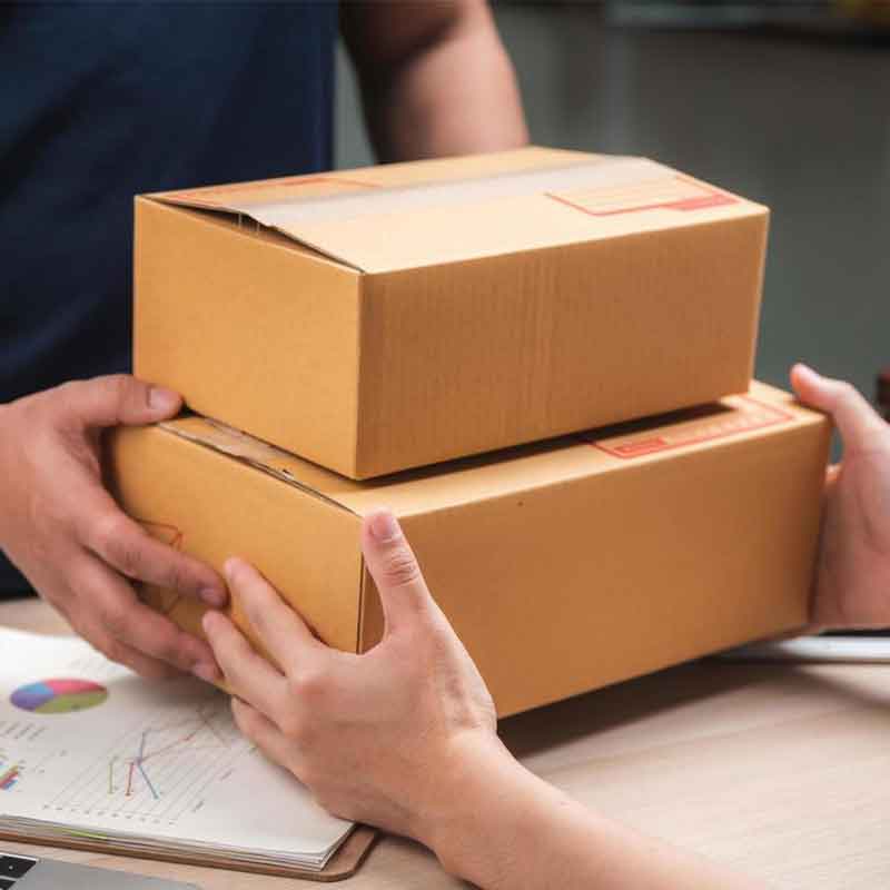 Courier holding a customer parcel